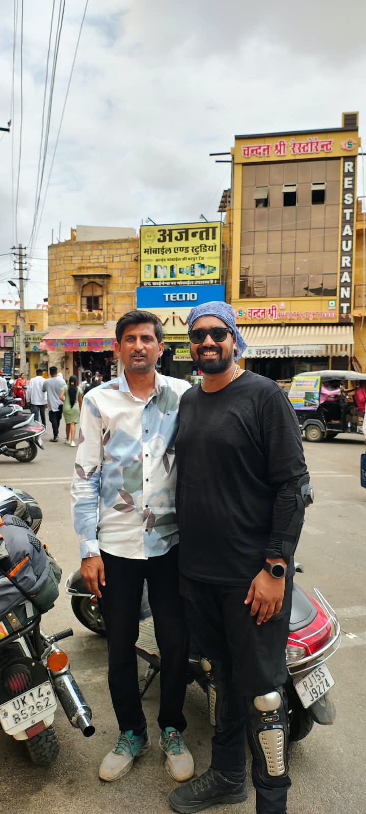 Saim with a rider in the city